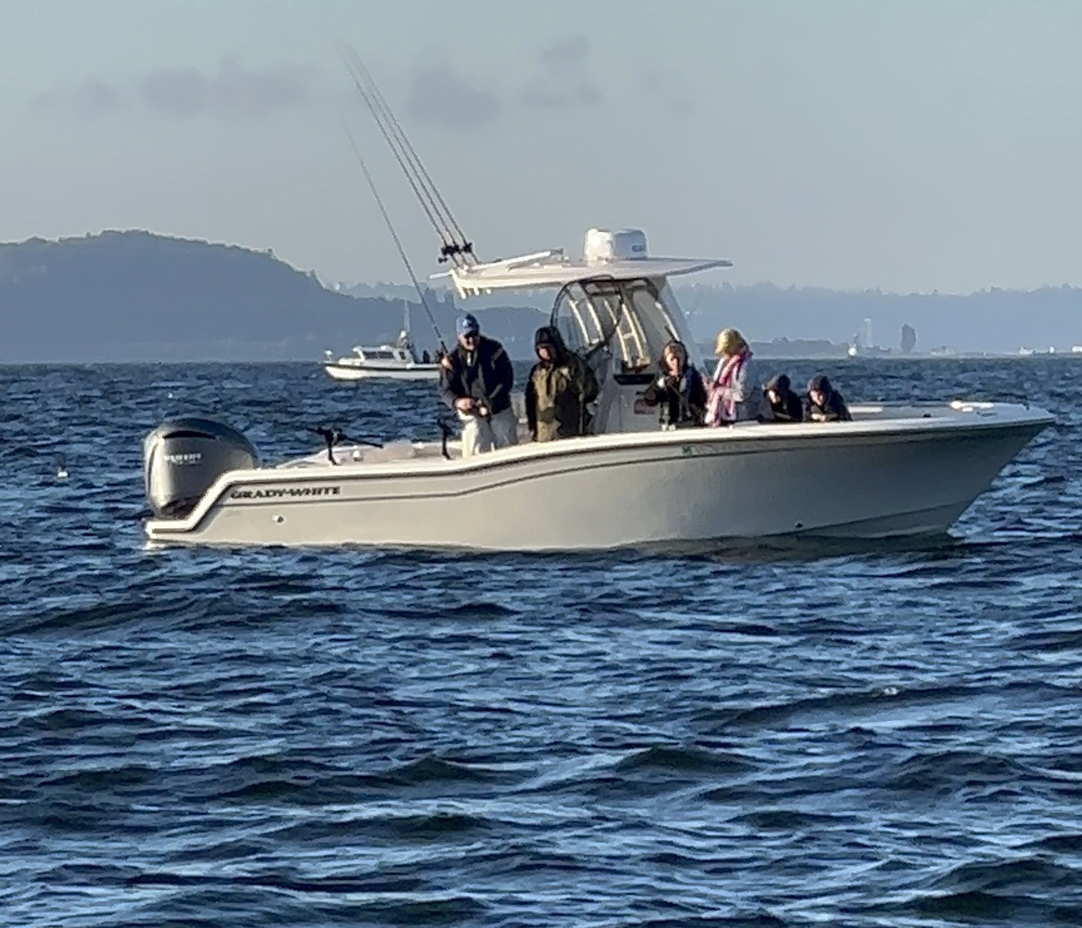 Fish Finders Seattle Fishing Charters- A fishing boat with family